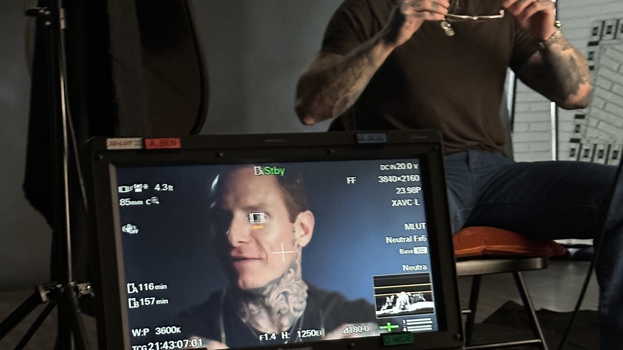 Zach Livingston near a production monitor during intervention filming